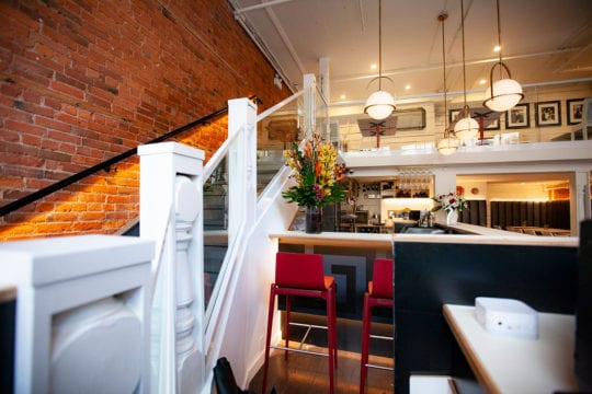 Stairs and bar of renovated Greek Restaurant.
