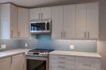 kitchen with close up of stove and microwave