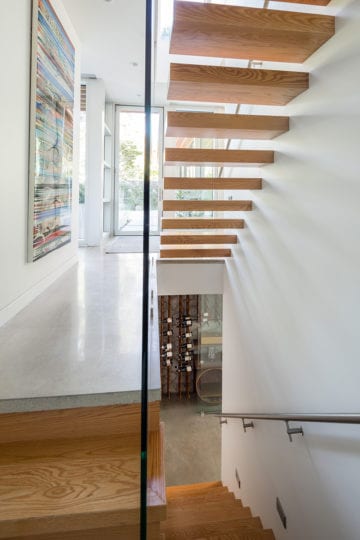Wooden stairs in custom-built Vancouver home.