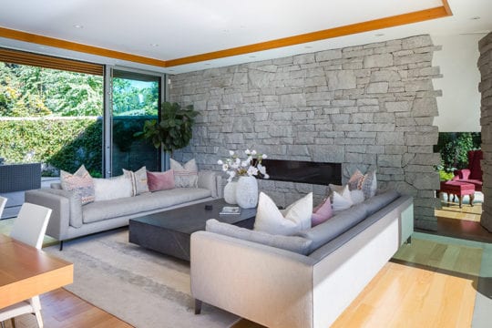 Open concept luxury living room in North Vancouver home.